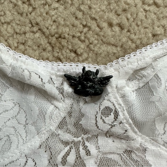 Relisted in my closet! 
Boys Lie UO Urban Outfitters white cropped lace bustier - Picture 4 of 7